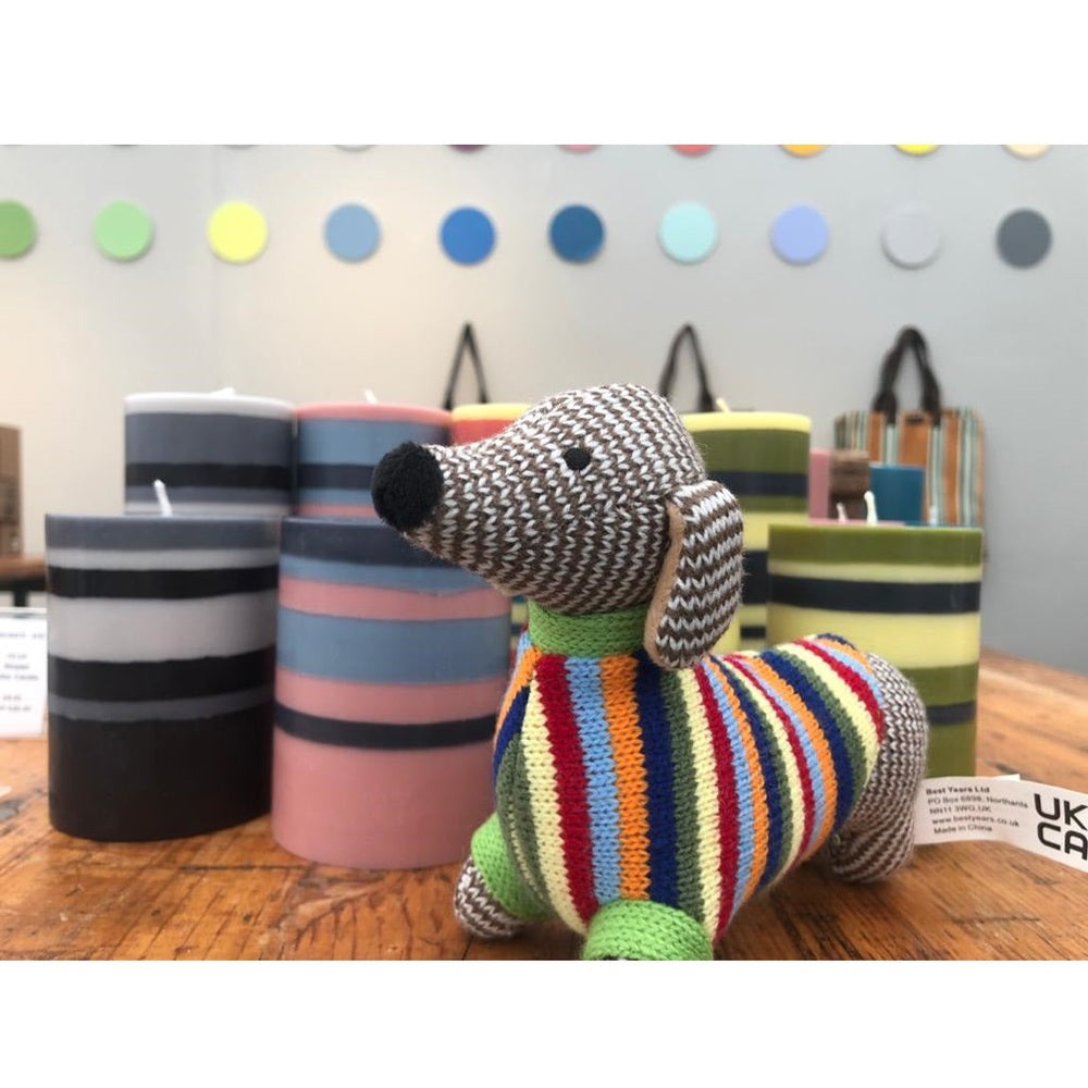 Best Years knitted sausage dog stuffed toy with a multicolor rainbow striped sweater