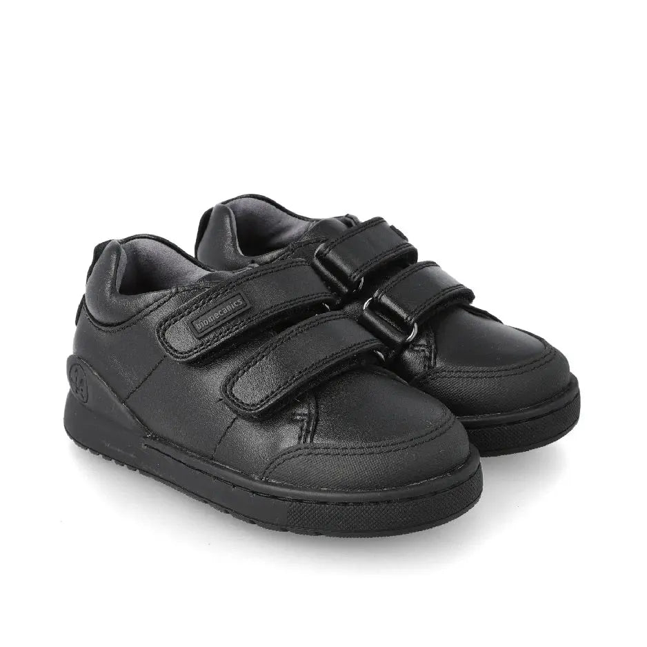Biomecanics Black Napa Double Velcro School Shoes, a pair of sturdy black leather kids' shoes securely fastened with two Velcro straps.