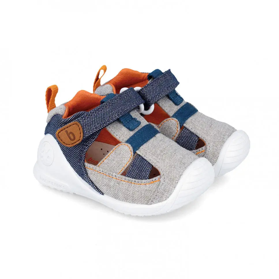 Biomecanics Canvas Sandals Azul Marino with navy straps and orange lining, white sole, shown with open-toed design and adjustable Velcro closures.