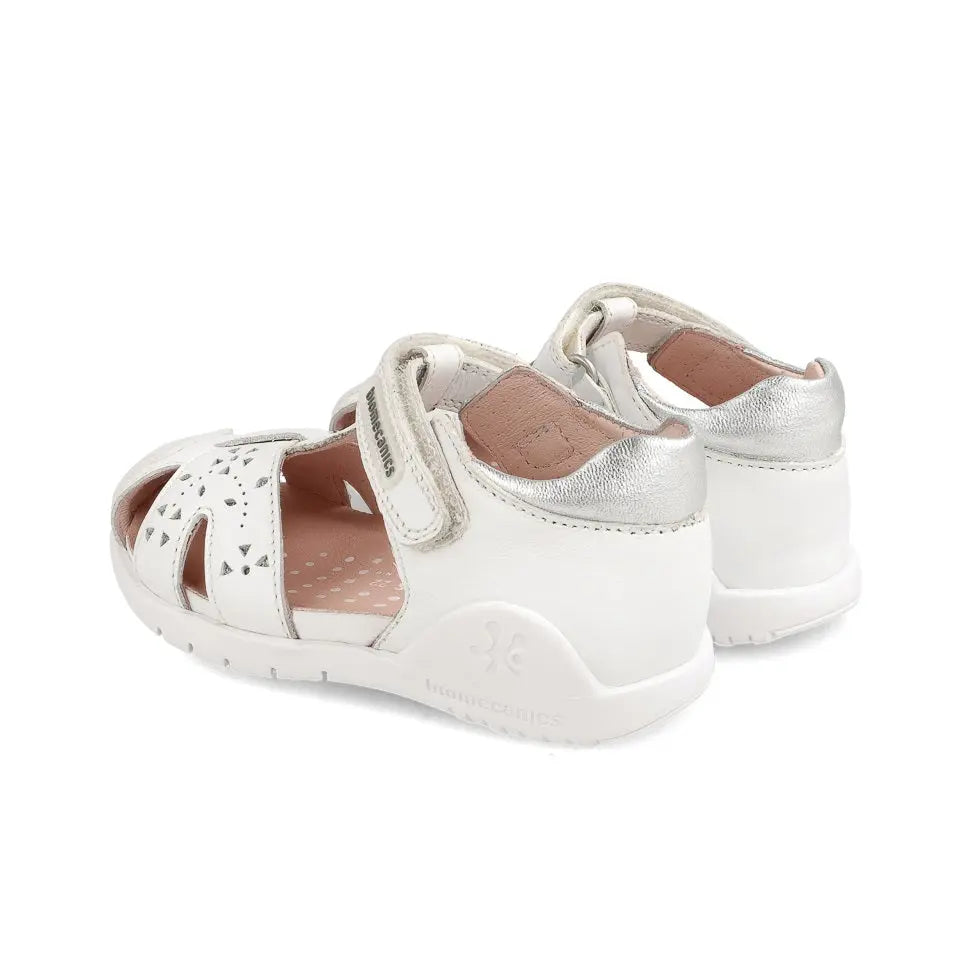 Biomecanics Sandalla Blanco baby sandals in white leather with perforated toe, pink lining, and Velcro straps shown side-by-side