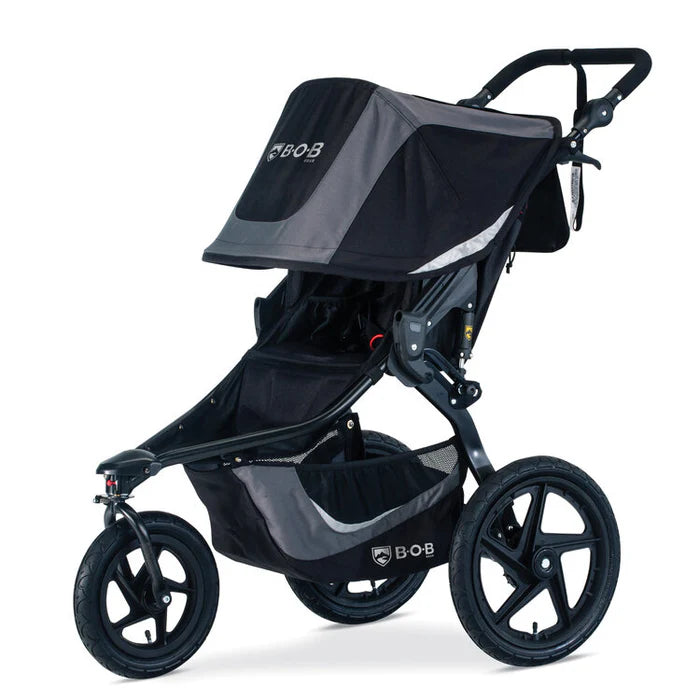 Bob Revolution Flex 3.0 Jogging Stroller in black/gray with expansive canopy, storage basket and rugged wheels