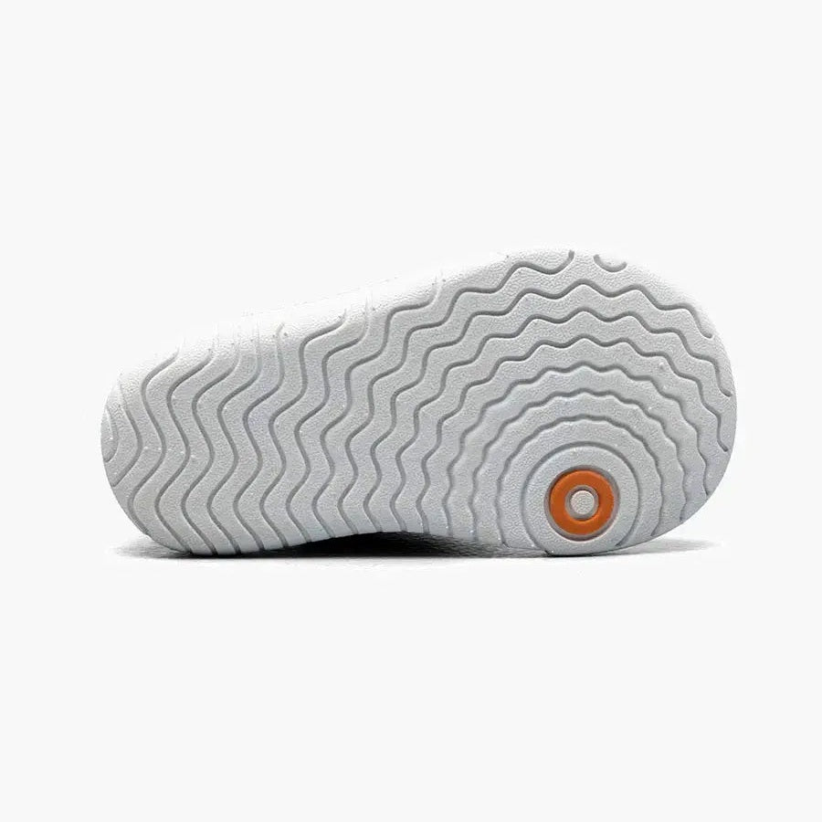 BOGS Baby Kicker Mid boot, black multi, shown from underside with wavy outsole and orange logo.