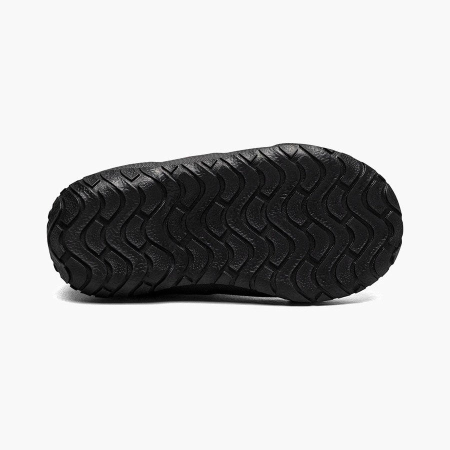 BOGS Rainboot Overlap Flowers sole up close, black rubber with textured tread for grip