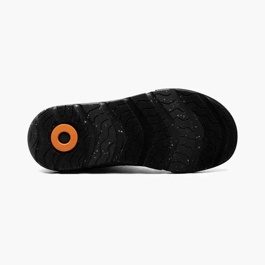 BOGS Skyline Kicker Mid Purple Multi toddler boot sole viewed from below, showing rugged black tread and orange logo for durable grip.