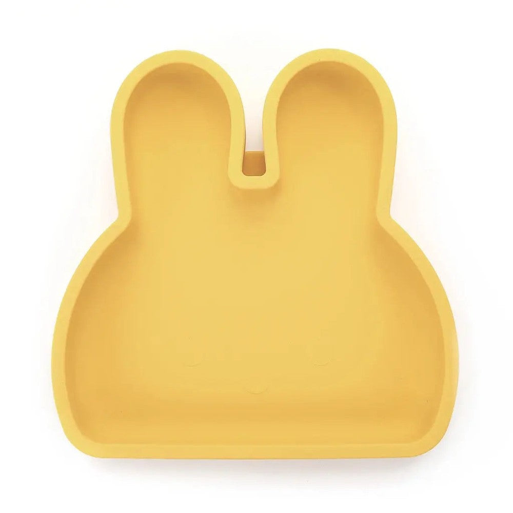 Bopomofo Bunny Silicon Plate in bright yellow with ear-shaped rim sits flat on white surface, BPA-free silicone dinnerware.