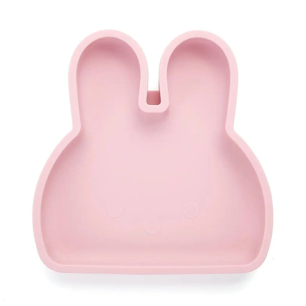 Bopomofo Bunny Silicone Plate with Suction Base in pastel pink, bunny-shaped plate firmly attached to table.