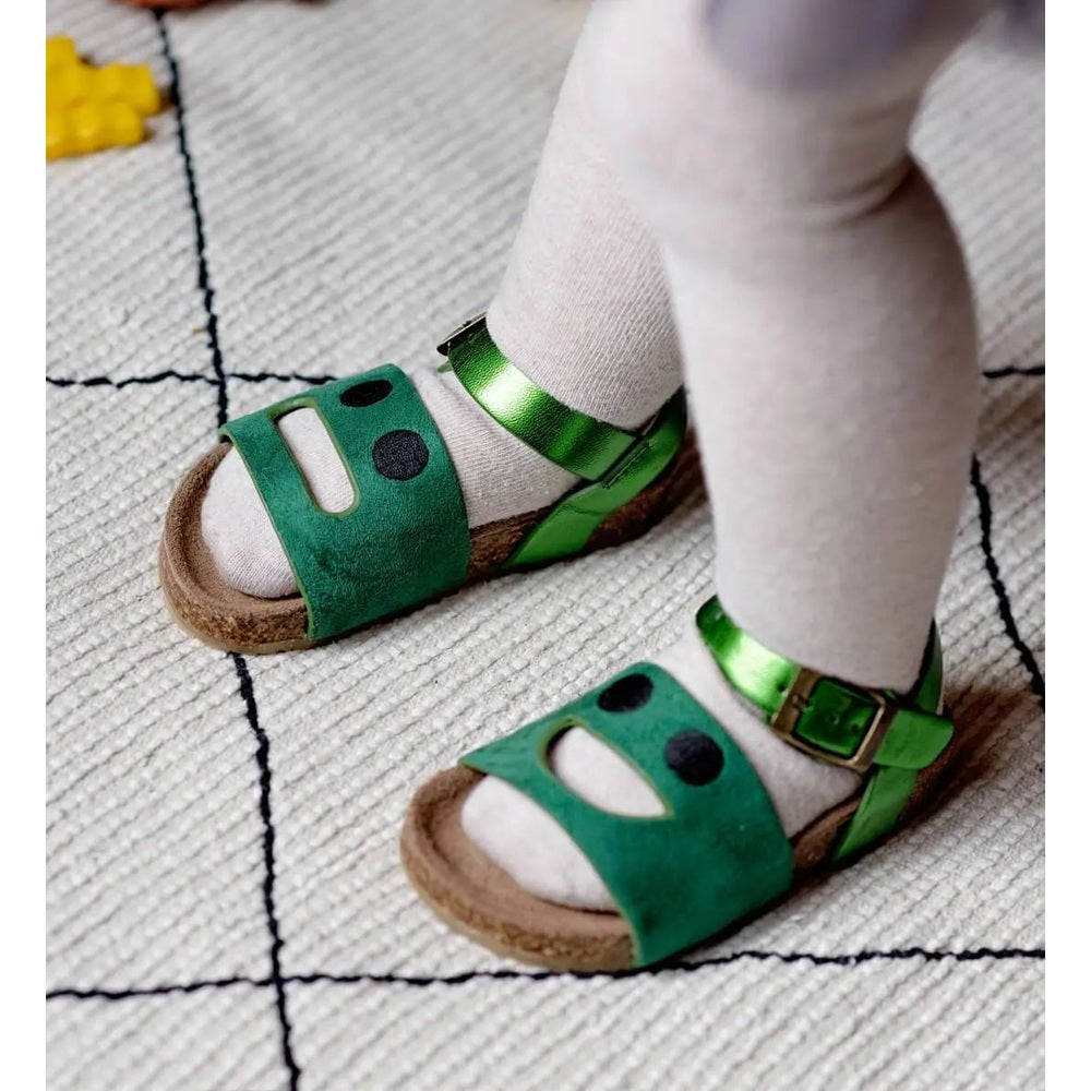 Boxbo Cork Sandal Wistiti Green on a child's feet, cork sole and green suede straps with buckle
