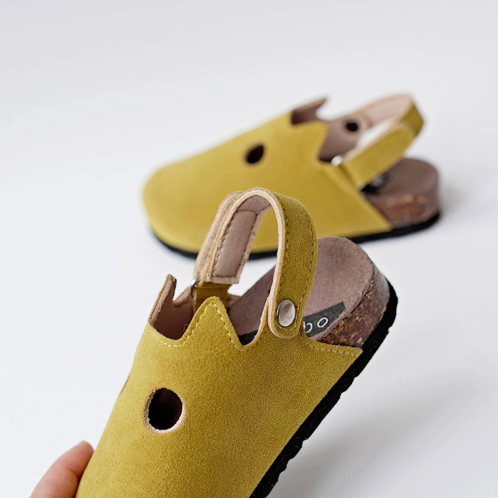 Boxbo Fox Cork Clog Sandals in mustard yellow with cork footbed and adjustable strap, shown in a two-pair display.