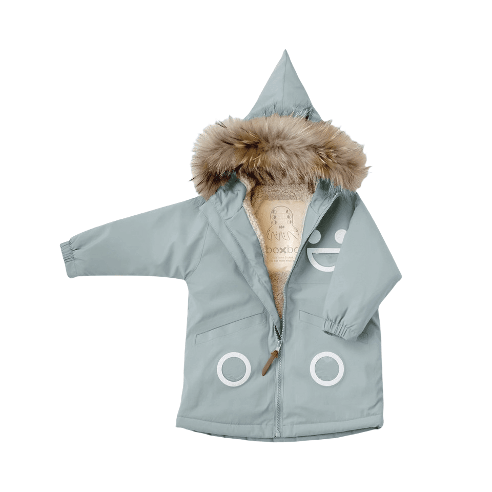 Boxbo Wistiti fleece-lined waterproof and snowproof fur jacket Misty Ice Blue with hood up and visible fleece lining.