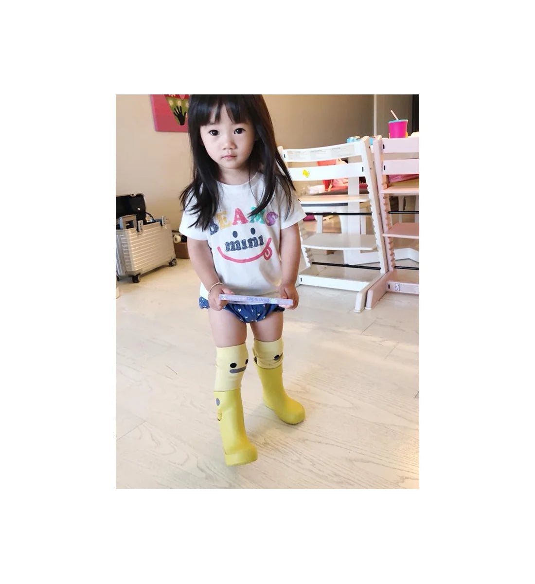 Child standing indoors wearing yellow BOXBO Wistiti high socks