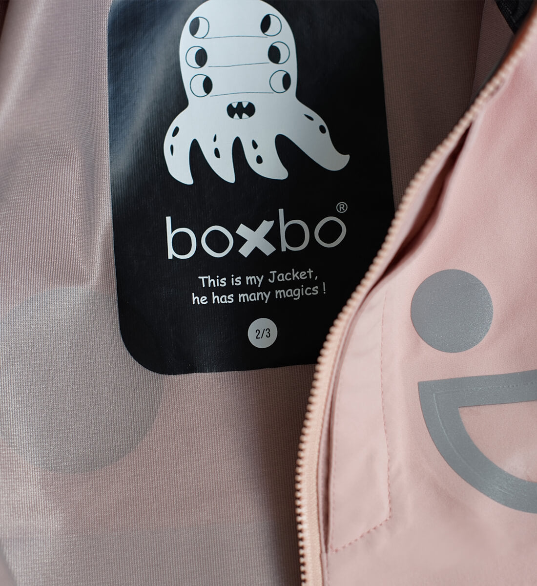 Boxbo Wistiti Windbreaker Rain Jacket Pink with gray graphic accents and visible zipper.