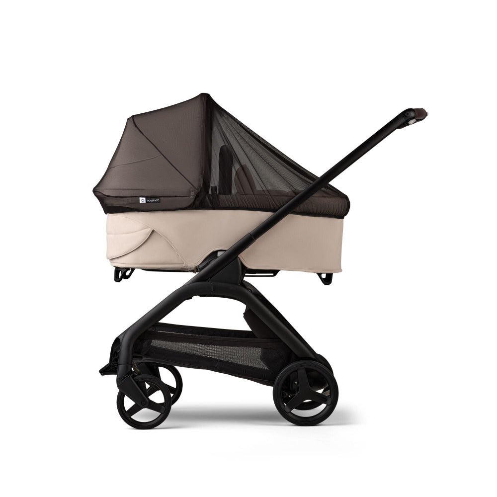 Bugaboo Butterfly/Dragonfly mosquito net over beige bassinet on black stroller frame