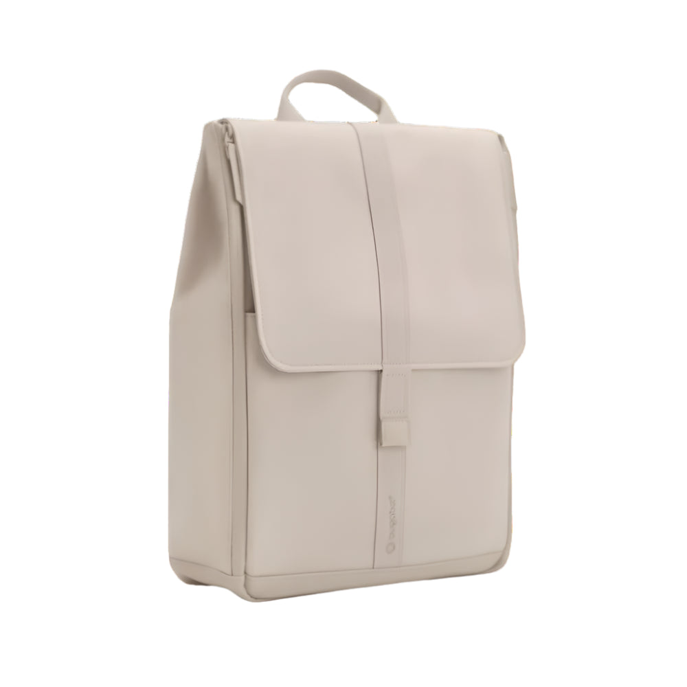 Bugaboo Changing Backpack beige diaper bag with flap closure and top handle.