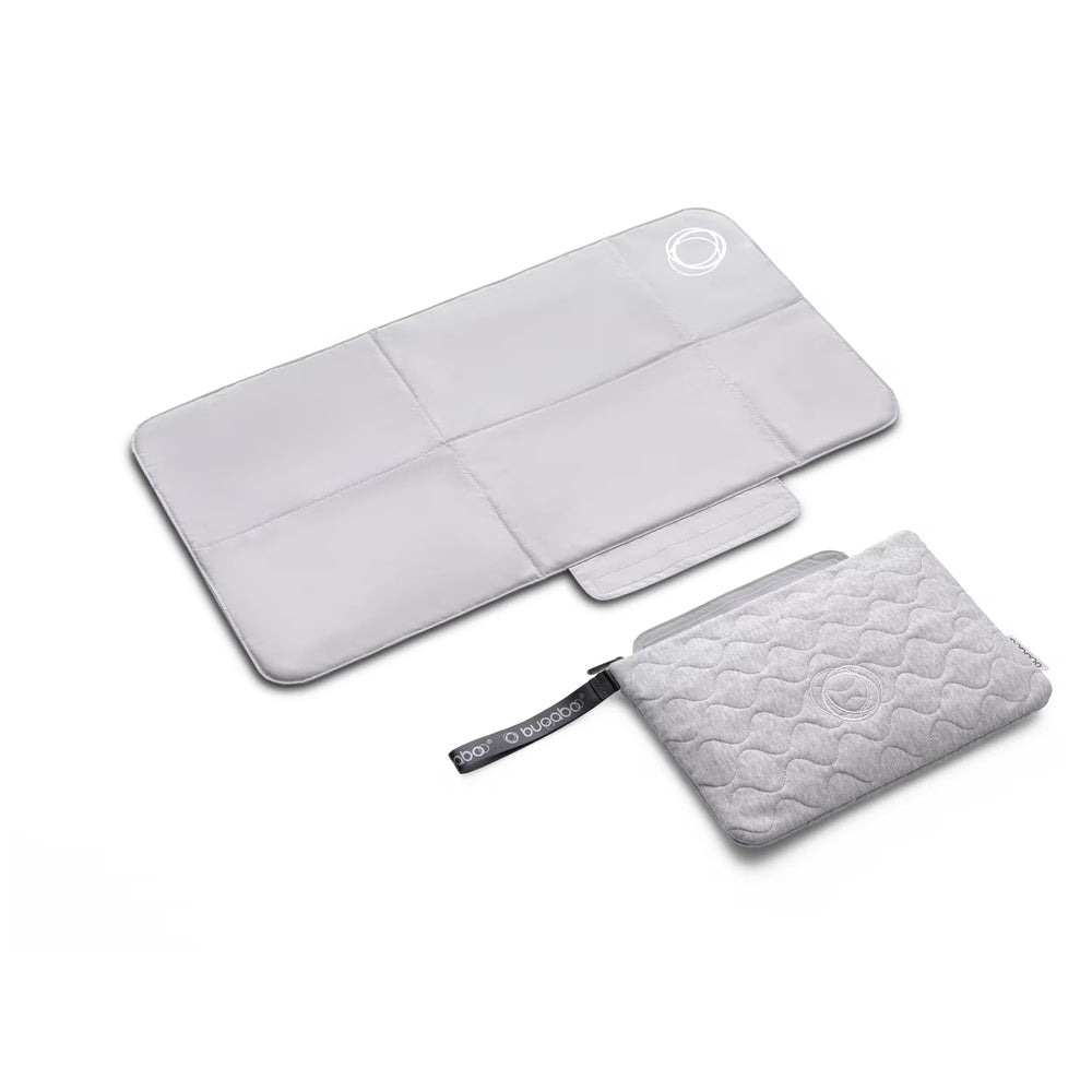 Bugaboo Changing Clutch in Light Gray with large rectangular changing pad and zippered quilted clutch.
