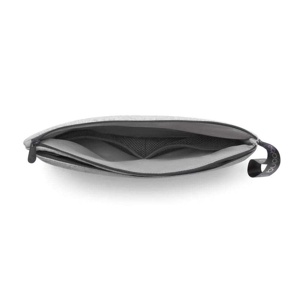 Bugaboo Changing Clutch in Light Gray, open view showing interior compartments and zip closure.