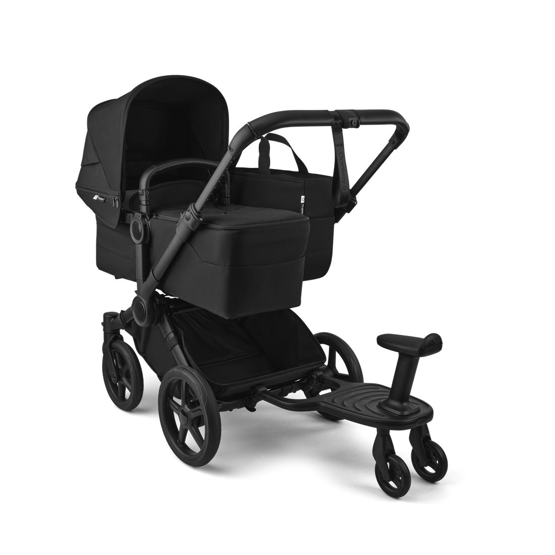 Bugaboo Donkey 6 — Bassinet configuration with optional comfort wheeled board and detachable seat. Wheeled board sold separately.
