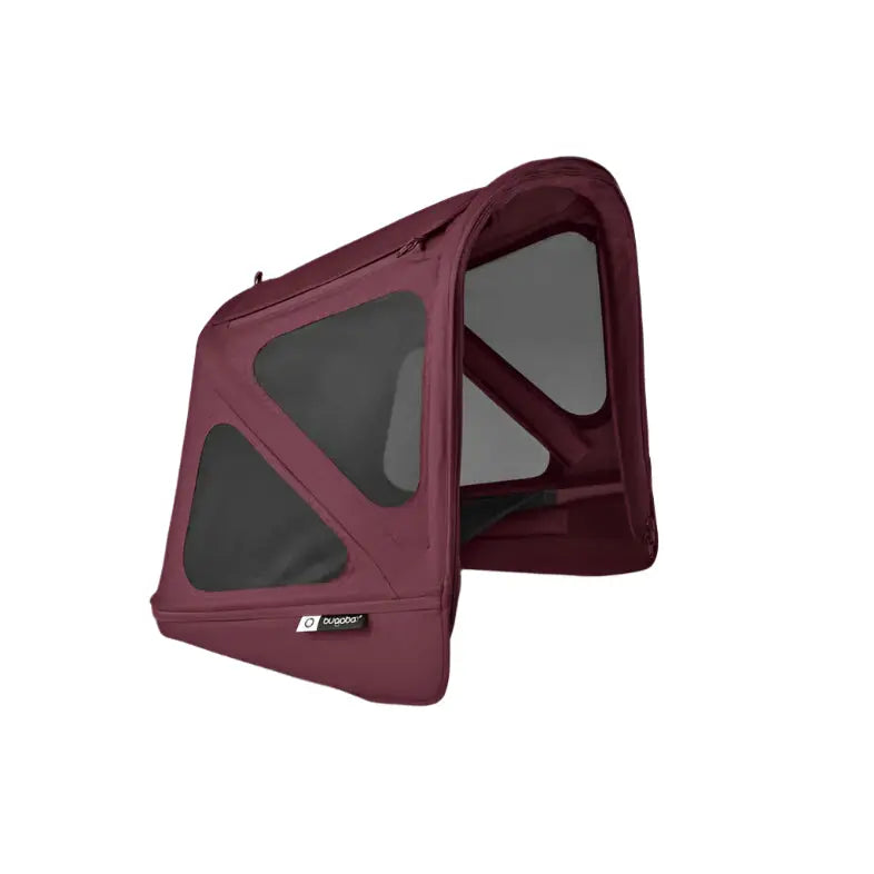 Bugaboo Donkey Breezy Sun Canopy in burgundy with mesh panels, shown attached to a stroller frame.