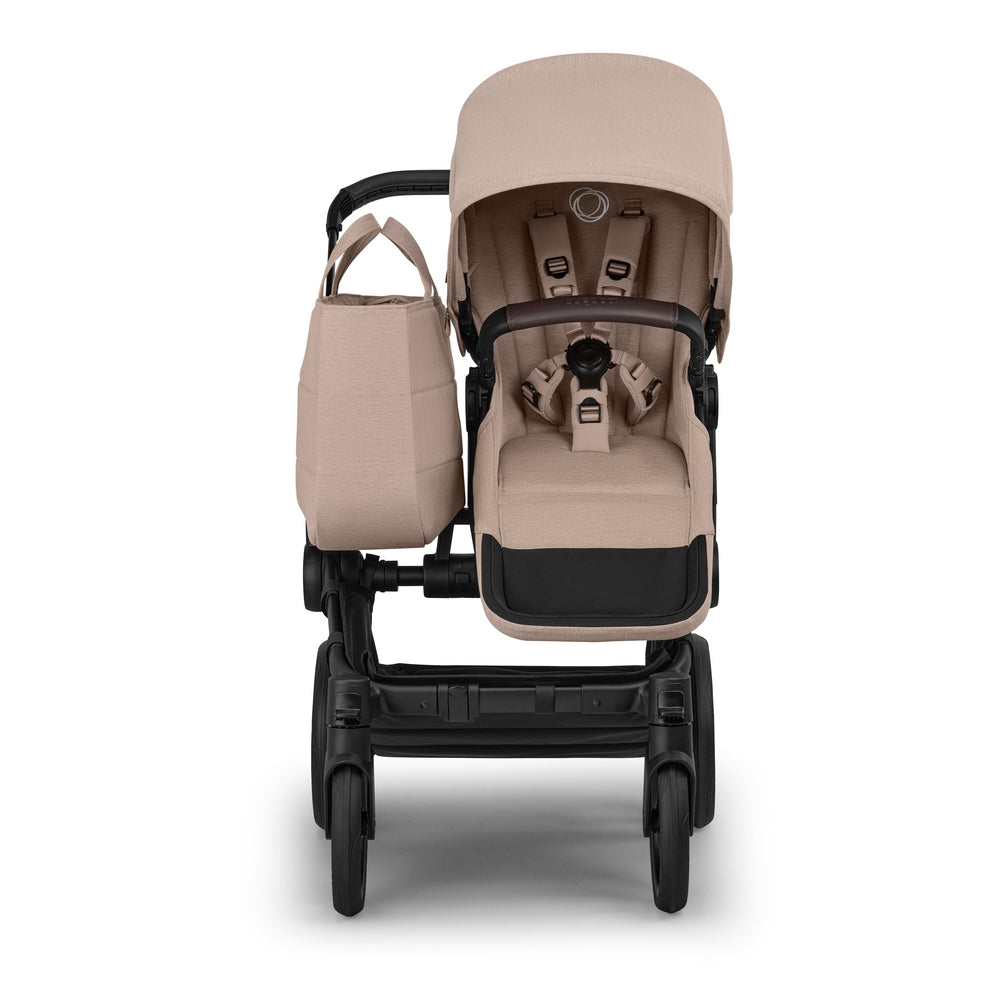 Bugaboo Donkey 6 Mono Stroller Complete in Beige with black chassis and beige bag.