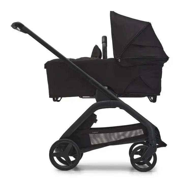 Bugaboo Dragonfly Pram Body Complete in black fabric mounted on a stroller chassis with handlebar.