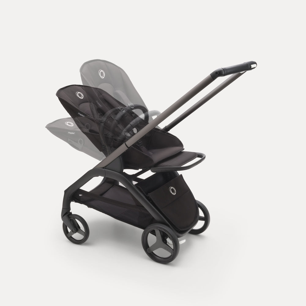 BUGABOO Dragonfly Stroller Complete in black, showing adjustable handlebar and reclining seat in three positions for easy street strolls.