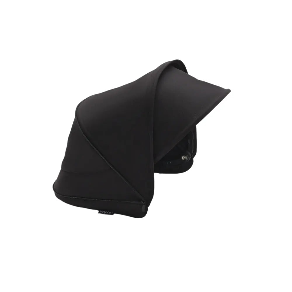 Bugaboo Dragonfly Sun Canopy in black attached to a stroller, providing full shade with an extended visor.