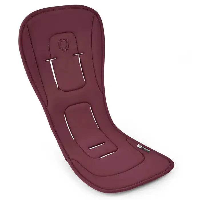 Bugaboo Dual Comfort Seat Liner in burgundy fabric laid flat for stroller use.