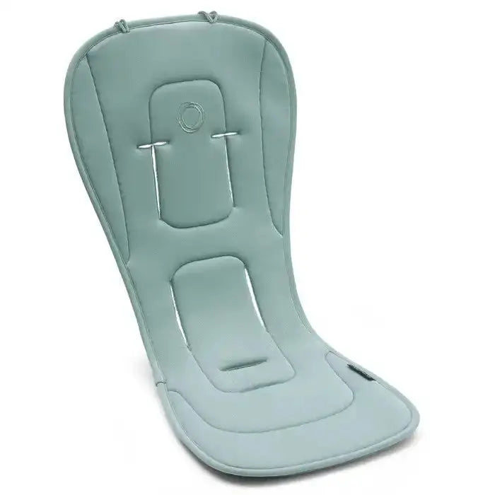 BUGABOO Dual Comfort Seat Liner, light green padded ergonomic insert laid flat for stroller use.