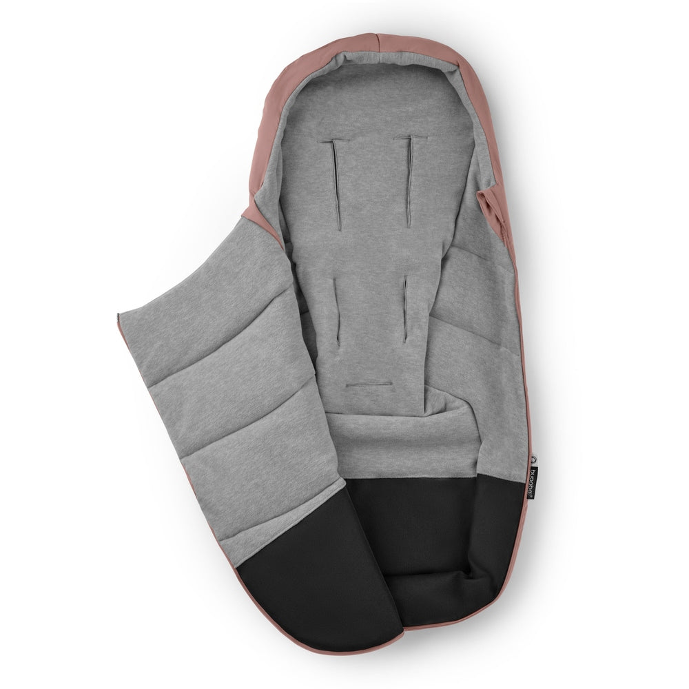 Bugaboo Footmuff in pink exterior with grey interior and black bottom