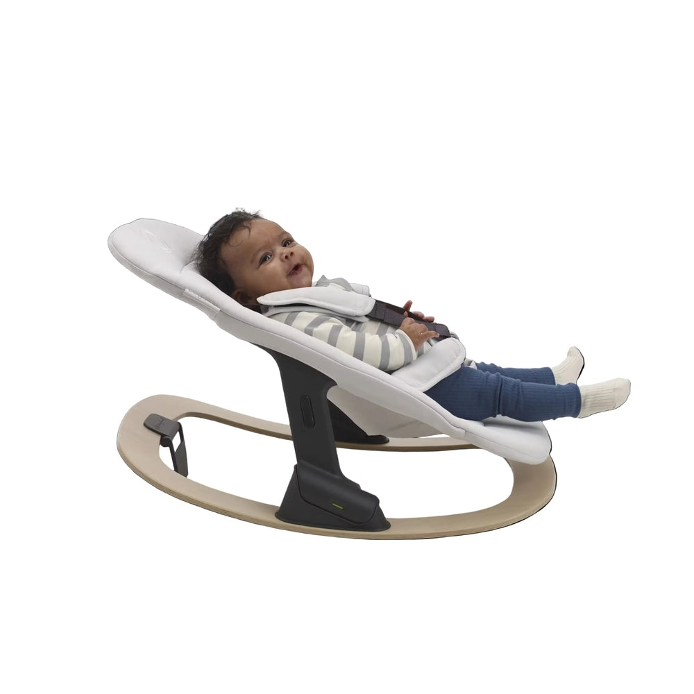 Bugaboo Giraffe Baby Rocker in white seat with beige wooden base and black frame