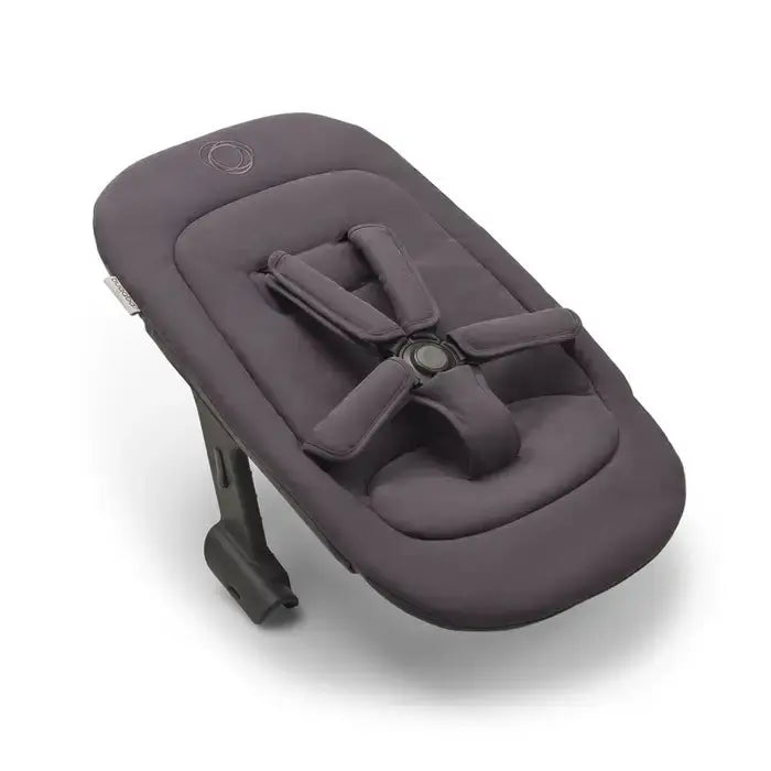 Bugaboo Giraffe Newborn Set high chair in dark gray fabric with buckled five-point harness.