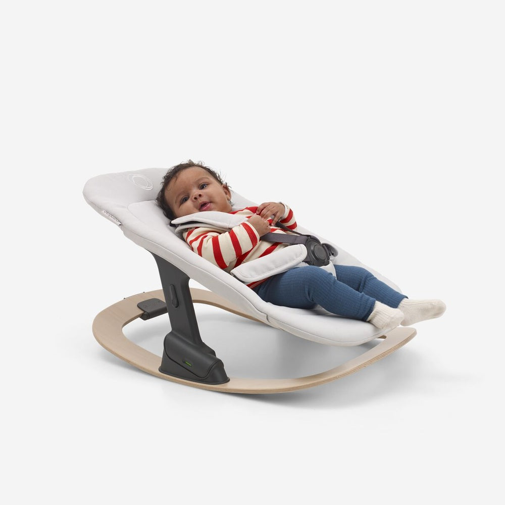 Bugaboo Giraffe Rocker Frame in neutral wood with white padded seat and safety harness