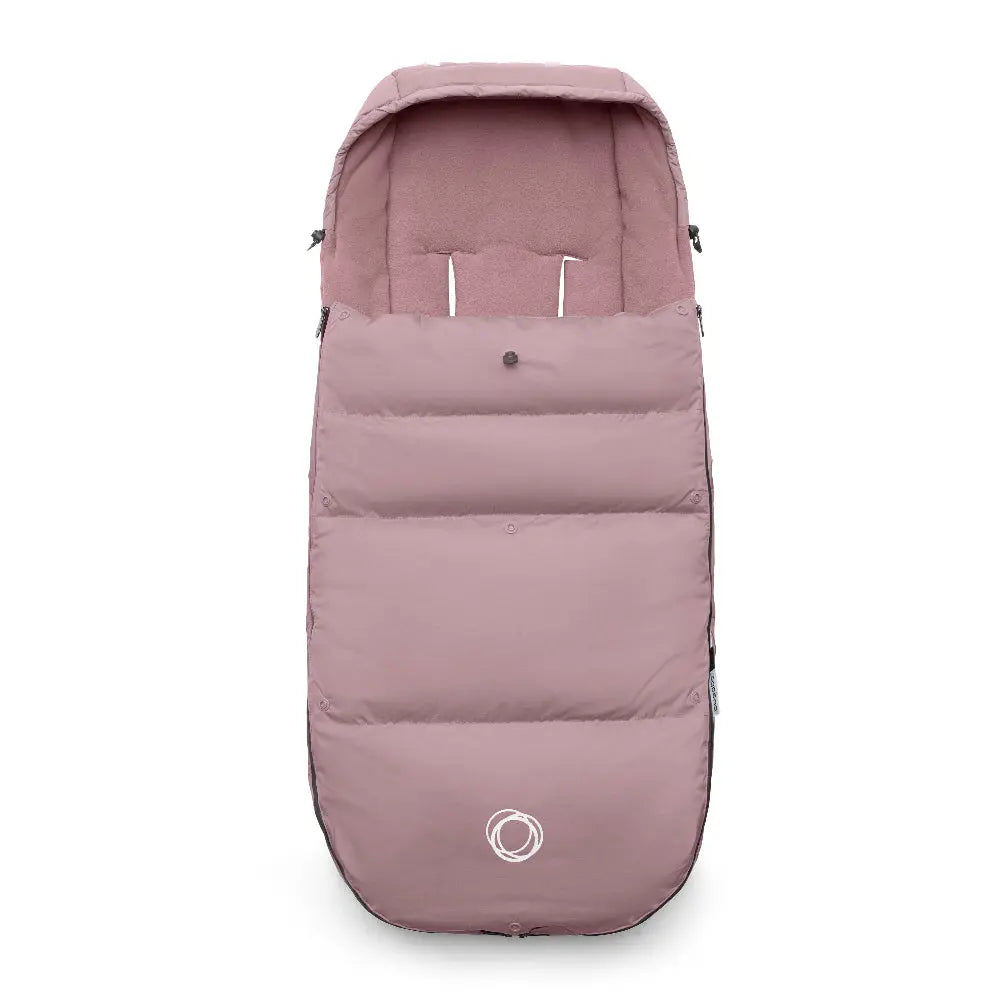 Bugaboo Performance Winter Footmuff in soft pink, insulated stroller cocoon with hood, secured for chilly rides.