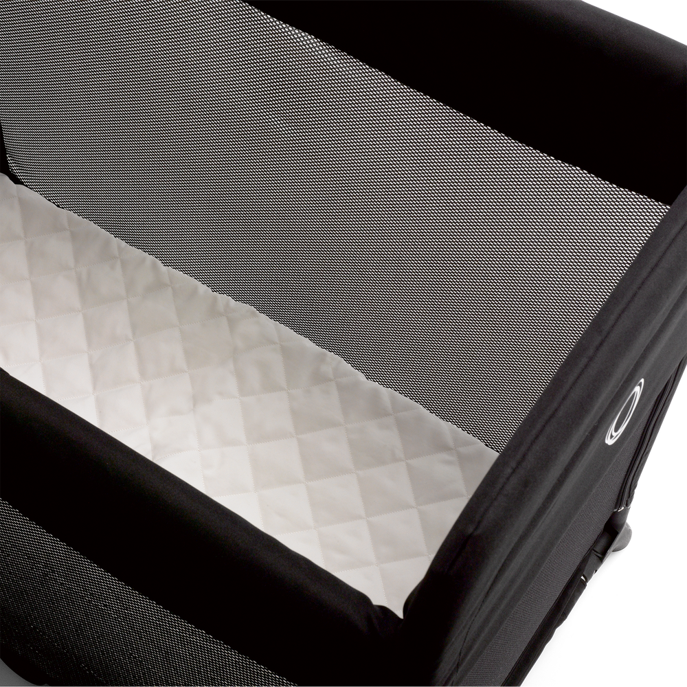 Bugaboo Stardust black play yard angled top view with mattress