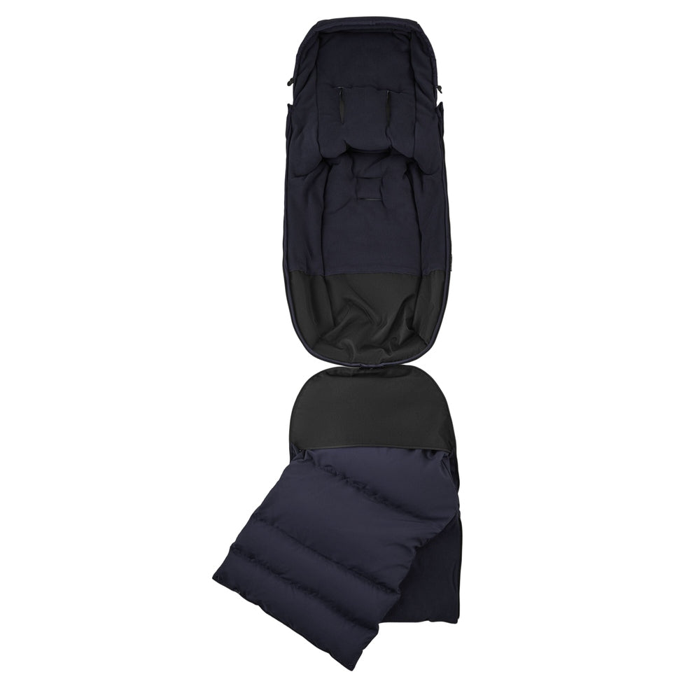 BUGABOO THERMOLITE Performance Footmuff in navy, insulated for winter strolls, opened to show plush interior.