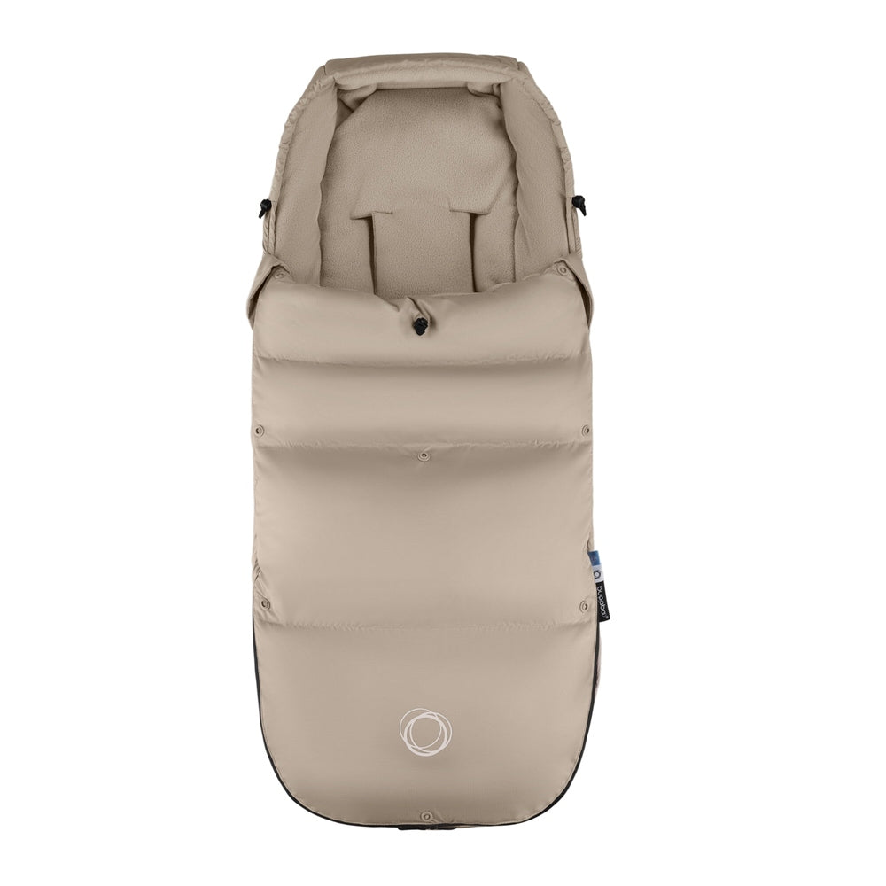 Bugaboo THERMOLITE Performance Footmuff in beige with insulated lining and drawstrings for winter stroller rides.