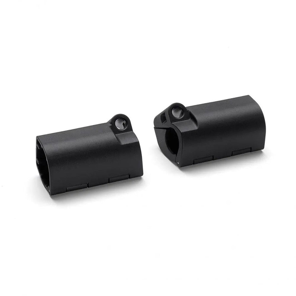 Bugaboo Wheeled Board Adapter (2015) pair of black plastic mounts with hinge-like lugs ready to attach to a stroller