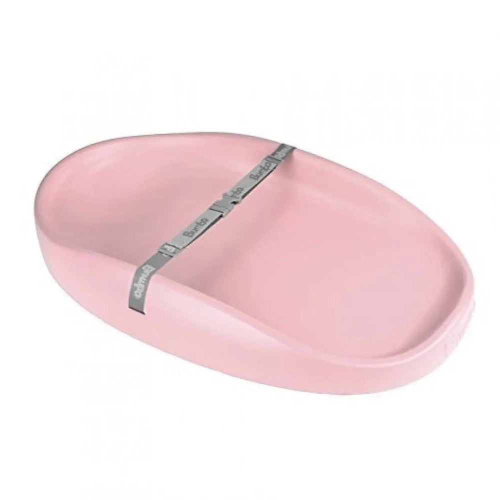 BUMBO Changing Pad in pink, oval diaper changing mat with a gray measuring tape across its surface.