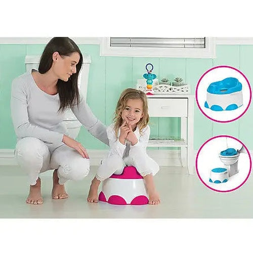 Bumbo Step 'N Potty toddler toilet trainer in pink and white; child sits on it as mom assists.