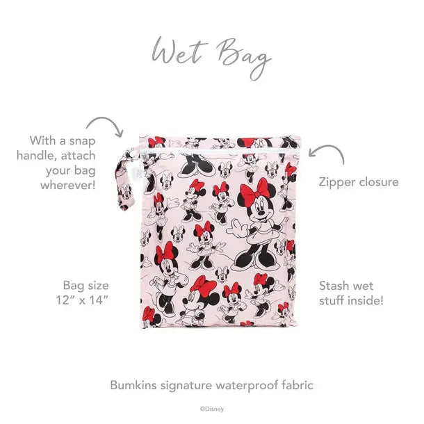 Bumkins Wet Bag in Minnie Mouse print on white waterproof fabric, 12x14, zipped shut and carried by its snap handle.