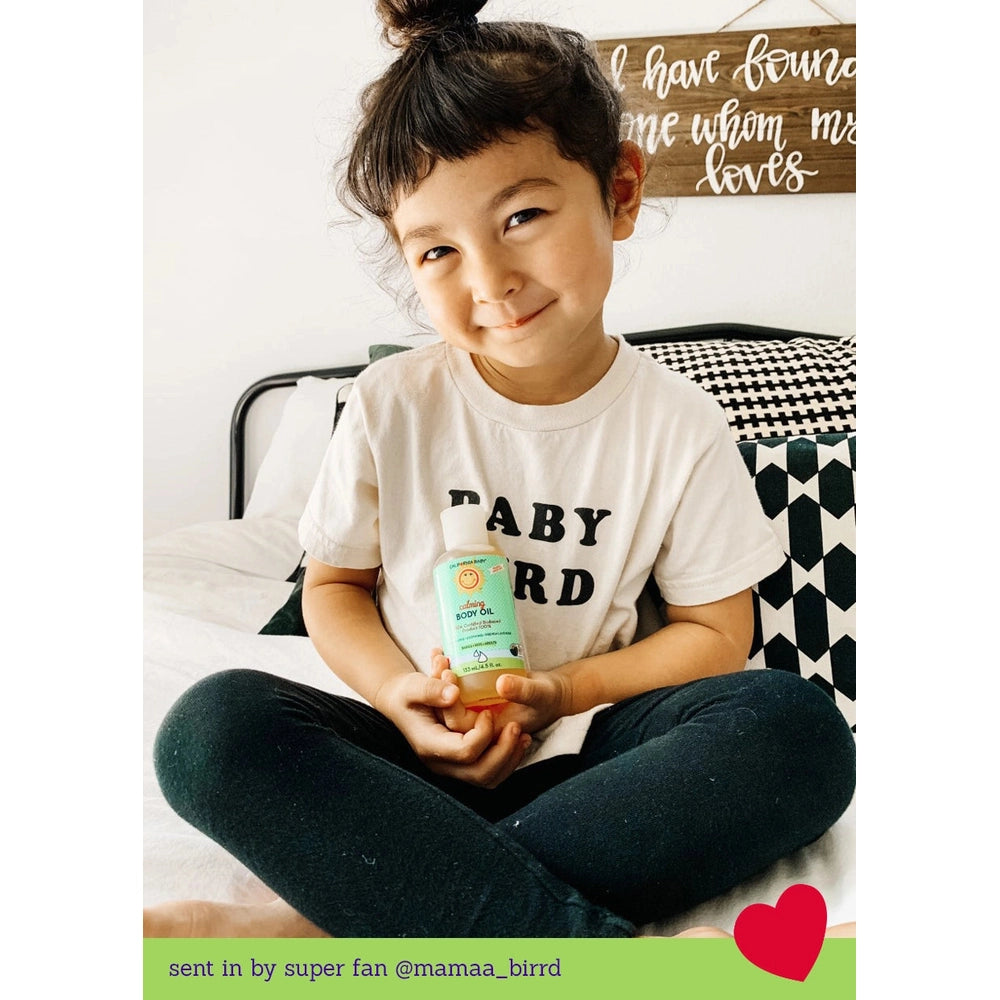 CALIFORNIA BABY California Baby Calming Body Oil 4.5 oz/133 ml turquoise label with character illustration on clear bottle img 2/3