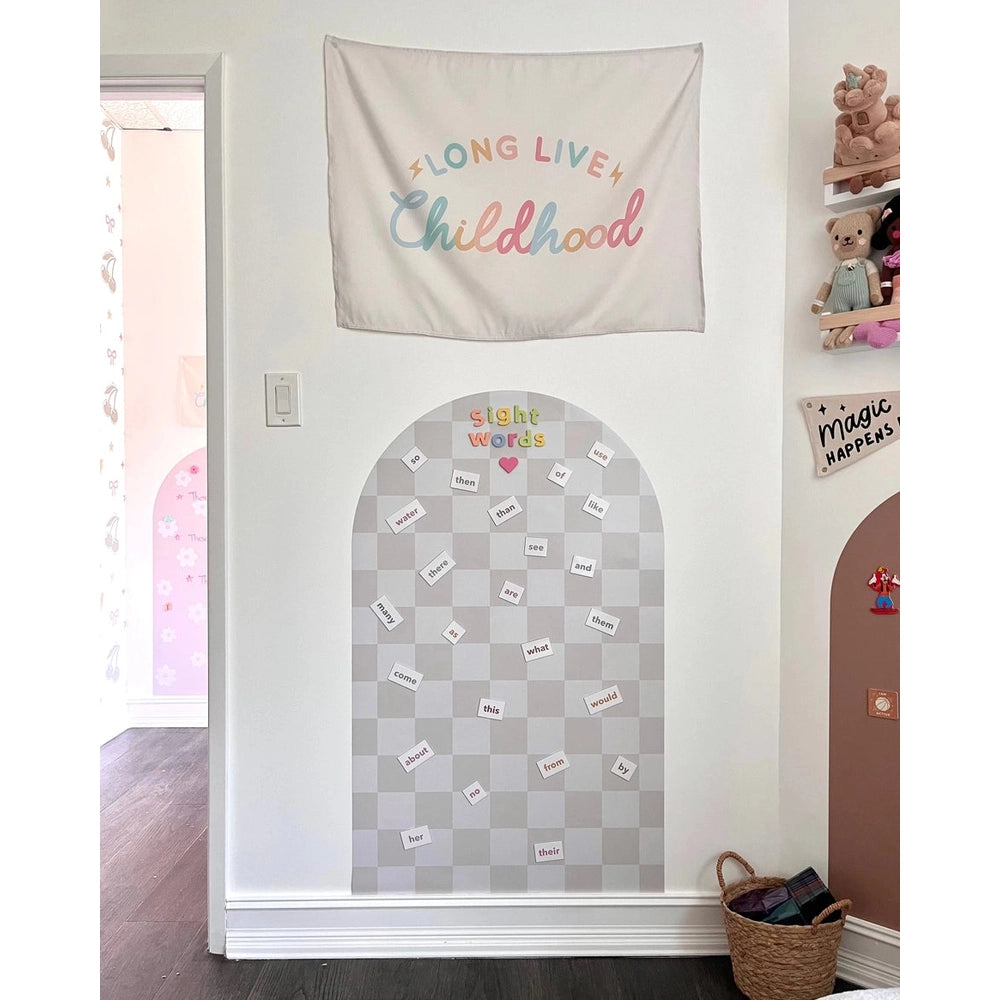 Cherrypick Sight Word Magnets in White tiles with black text on a gray checkerboard arch panel