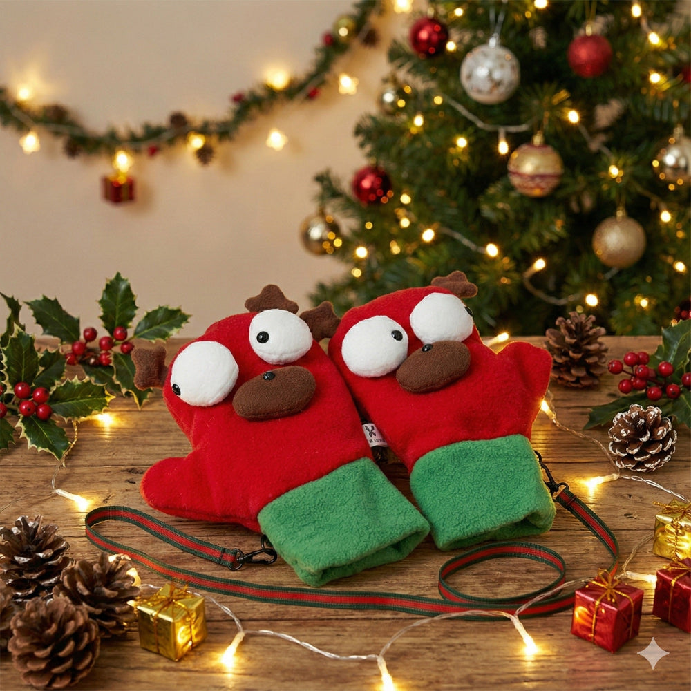 Red and green dog mittens with a Christmas tree and decorations in the background