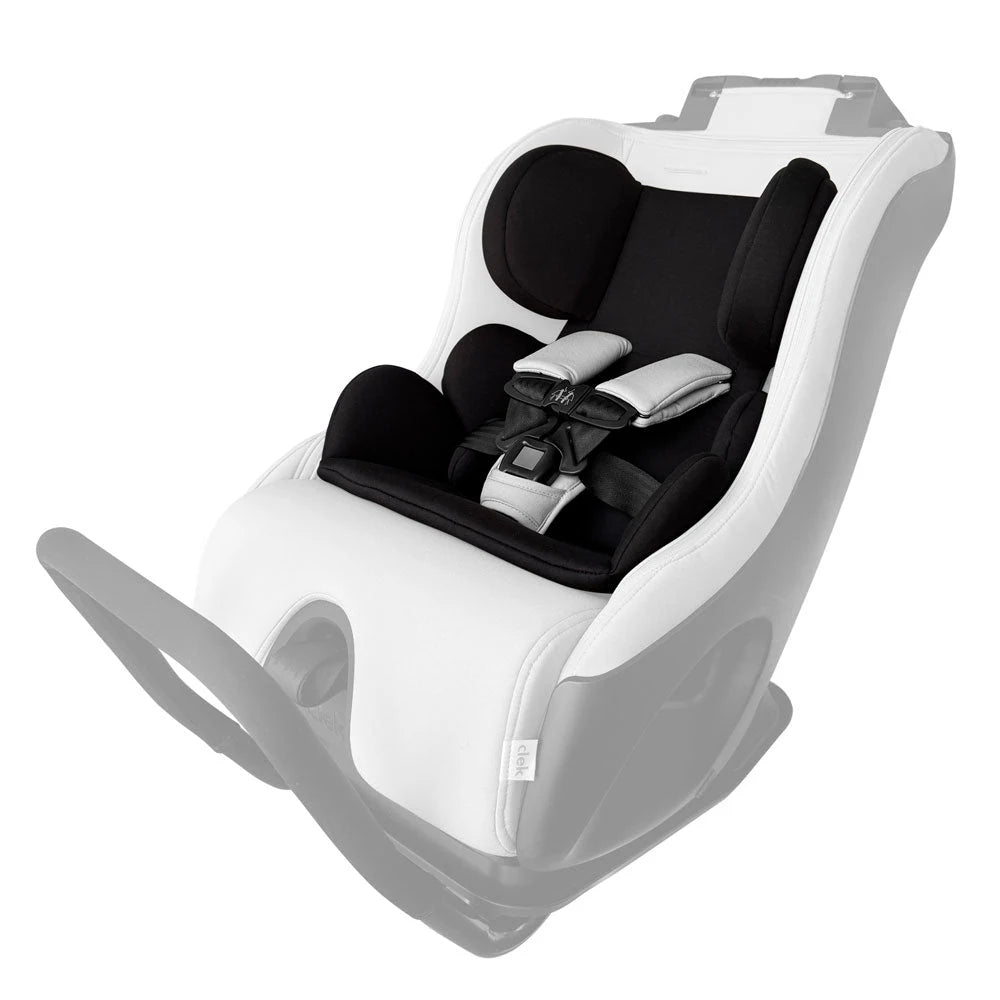 Clek Car Seat Infant-Thingy in white shell with navy padding; 5-point harness clipped at the red buckle.