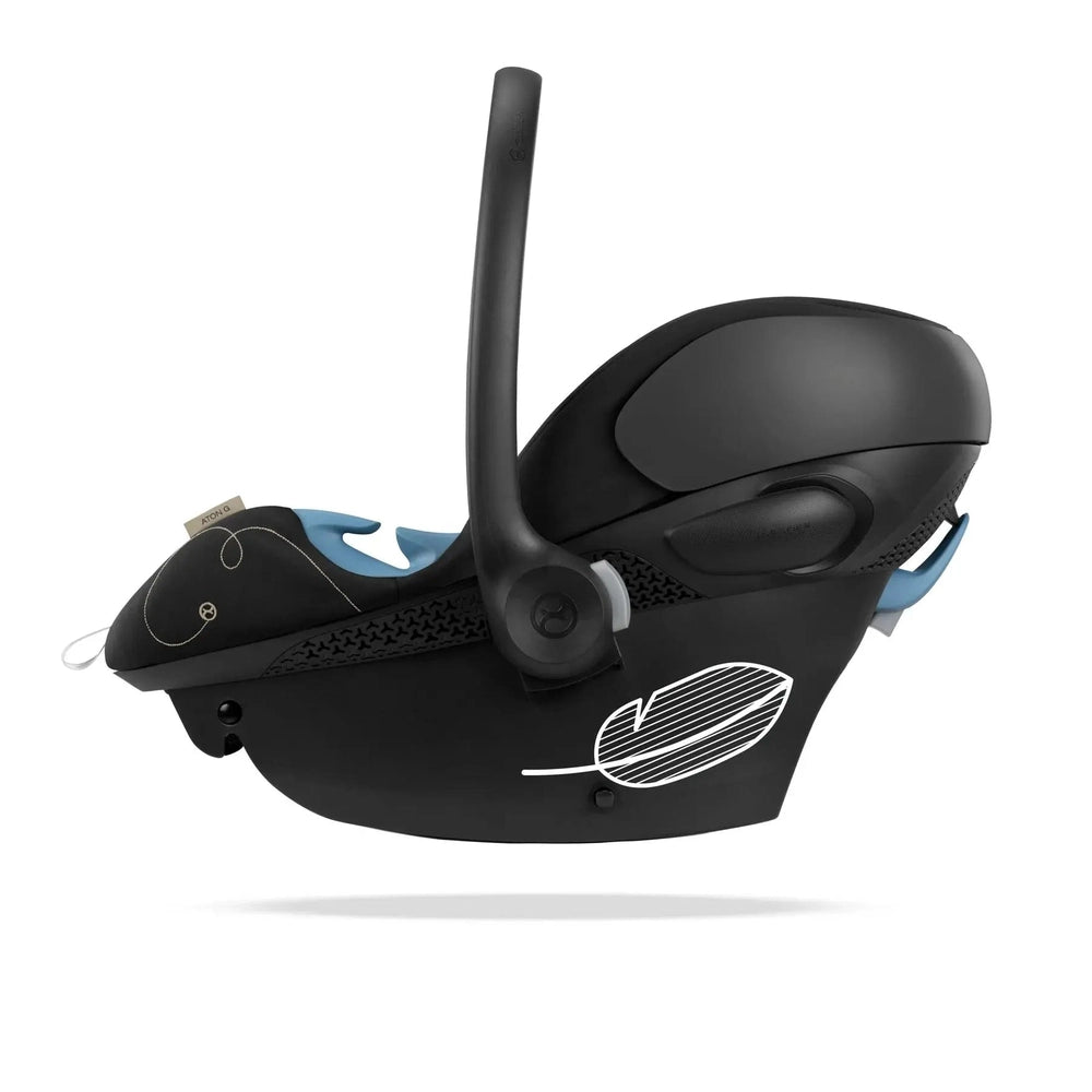 Close-up of the Cybex Aton G Swivel Sensorsafe Infant Car Seat black with blue interior, shown with the swiveling handle.