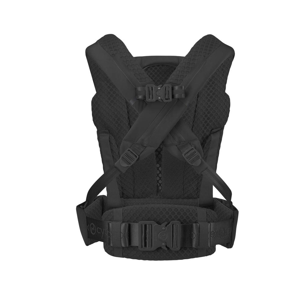 Close-up of the Cybex Coya Carrier black baby carrier with padded shoulder straps and waist belt.