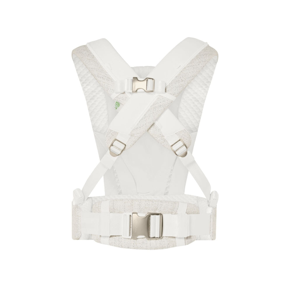 Close-up of the Cybex Coya Carrier Boucle white boucle cybex coya baby carrier with beige textured straps, cross-back harness, and padded waist belt.