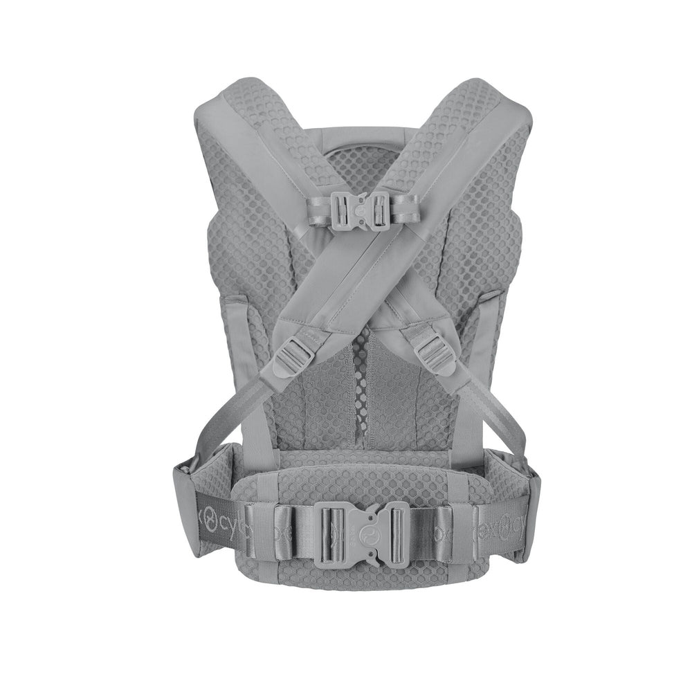Close-up of the Cybex Coya Carrier grey cybex coya baby carrier, back view with cross-back padded straps, waist belt, and honeycomb mesh panels.