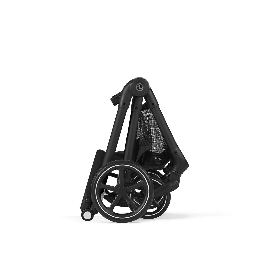 Close-up of the Cybex Eos 5-In-1 Travel System Stroller + Lightweight Aton 2 Infant Car Seat With Sensor Safe folded in black with large wheels.