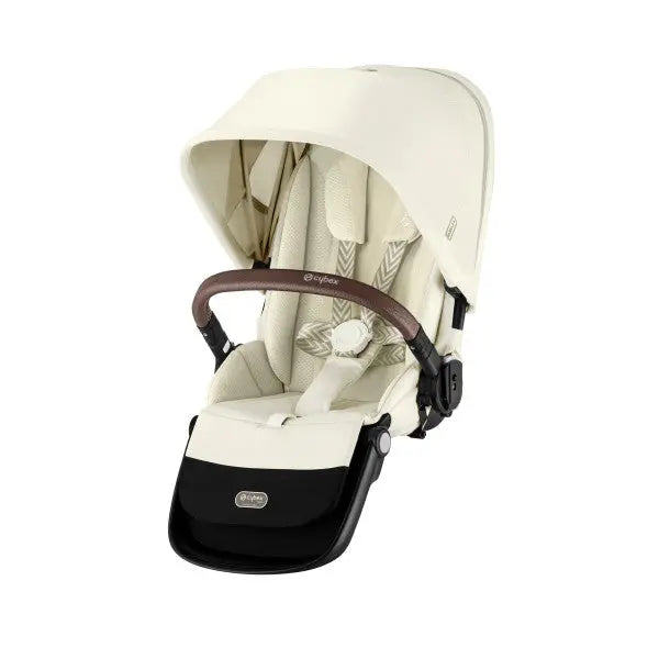 Close-up of the Cybex Gazelle S V2 Toddle Seat in beige with brown leatherette handle and extended canopy.