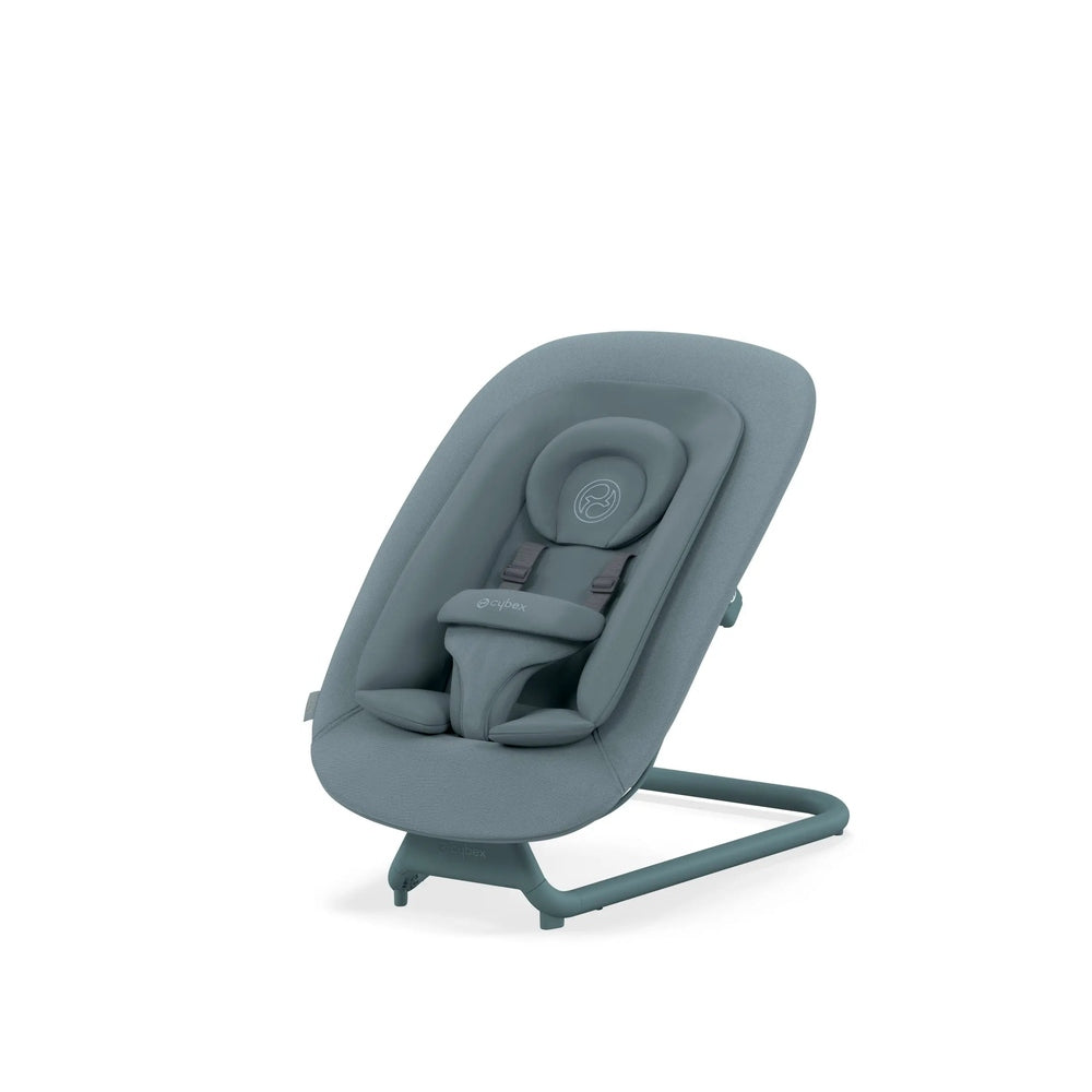 Close-up of the Cybex Lemo 2 Bouncer in blue-gray fabric with cushioned harness on a gray metal stand.